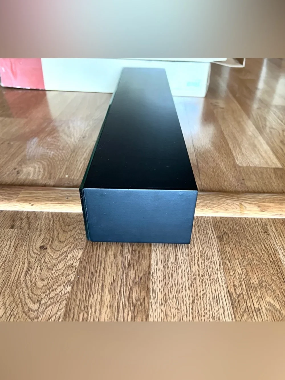 Modern Black Wall Display Shelf with Mirrored Front